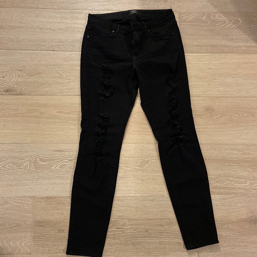 Stretchy black ripped jeans